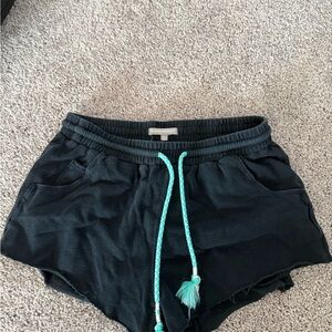 Modern Amusement Black Shorts with Turquoise Drawstring